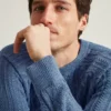 Jersey de cuello redondo de algodón con trenzado