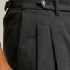 Pantalones chinos elásticos con pliegues Pantalones chinos elásticos con pliegues