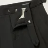 Pantalones chinos elásticos con pliegues Pantalones chinos elásticos con pliegues