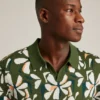 Polo de punto con estampado floral Polo de punto con estampado floral