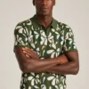 Polo de punto con estampado floral Polo de punto con estampado floral