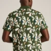 Polo de punto con estampado floral Polo de punto con estampado floral