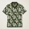 Polo de punto con estampado floral Polo de punto con estampado floral