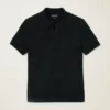 Polo de punto con rayas texturizadas Polo de punto con rayas texturizadas