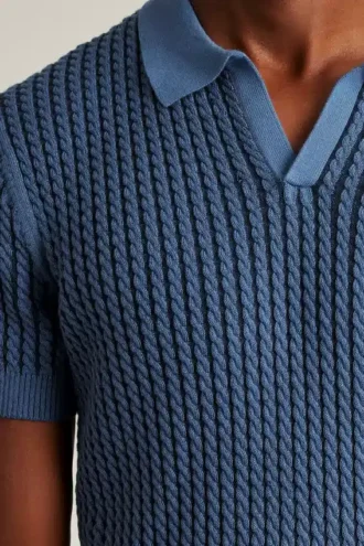 Polo de punto trenzado
