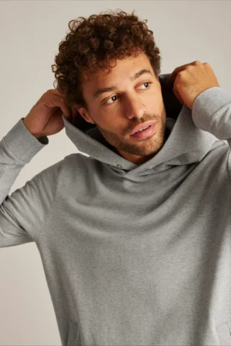 Sudadera con capucha de felpa elástica y botones a presión